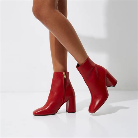 red heel boots women.